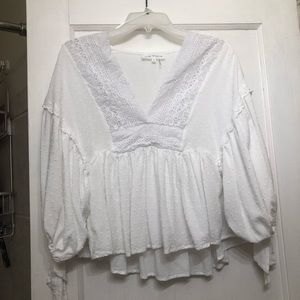 South moon under white blouse